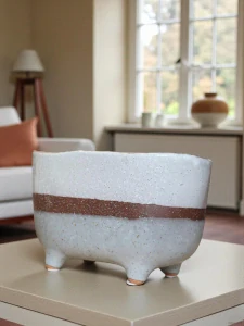 Pruhovaný květináč s nožičkami ovál