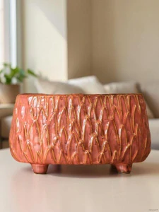 Sytě oranžový keramický obal 